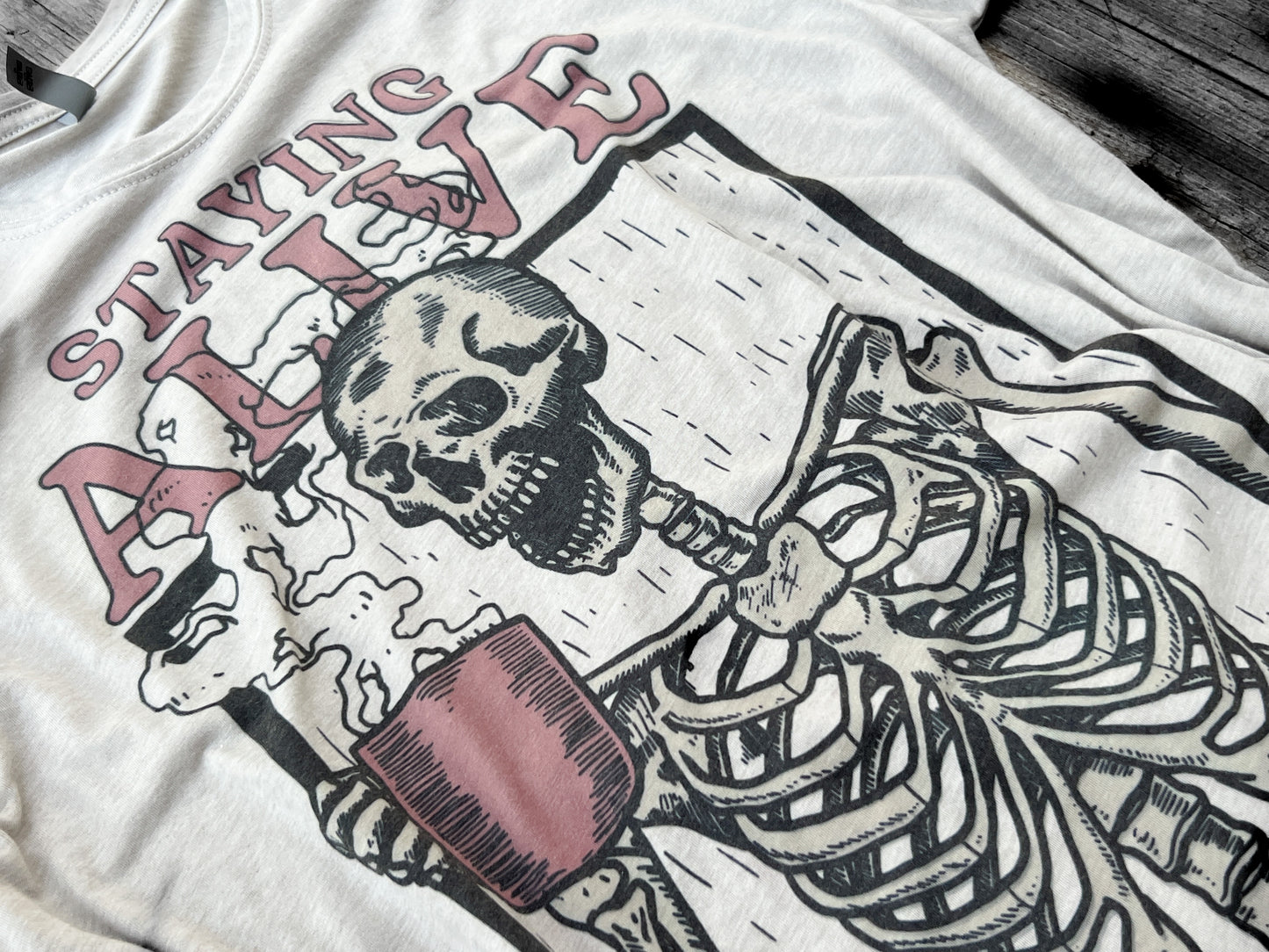 Staying Alive Skeleton Coffee Tee | Skelly Graphic Shirt